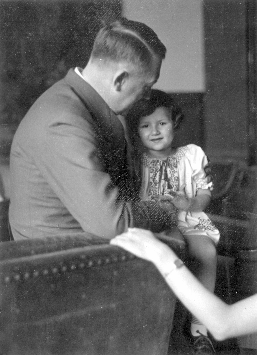 Adolf Hitler with Uschi Schneider in the Berghof great hall, from Eva Braun's albums 